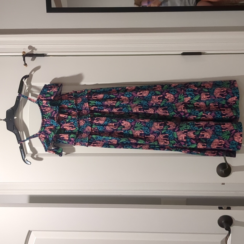 Cat and Jack size Medium. Jungle looking with tigers and many colors.